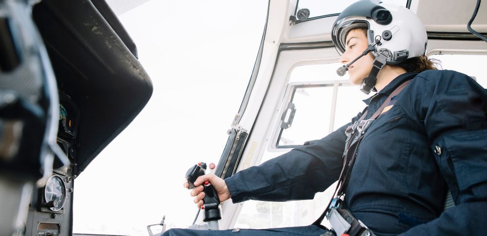 Instructor and pilot reviewing flight documents